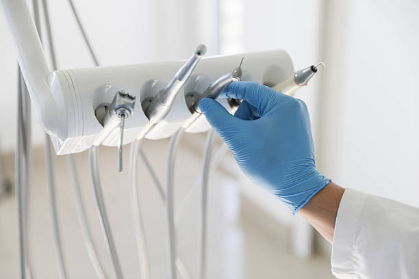 Professional Tooth Extraction technician working in McLouth, KS